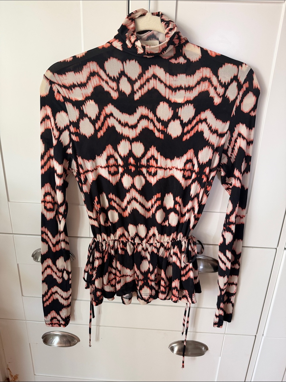 Ulla Johnson Black and Pink Patterned Long-Sleeve Turtleneck Peplum Top